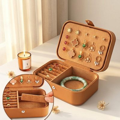 Small and portable brown leather travel jewelry box