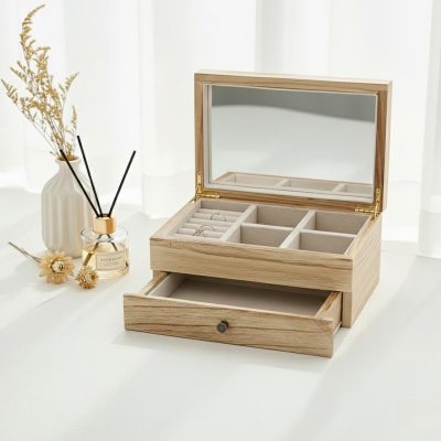Light-colored wooden drawer jewelry box